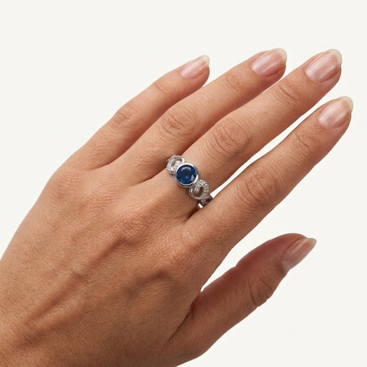 Elegant Blue Gemstone Heart Ring with Crystal Details – Silver Finish