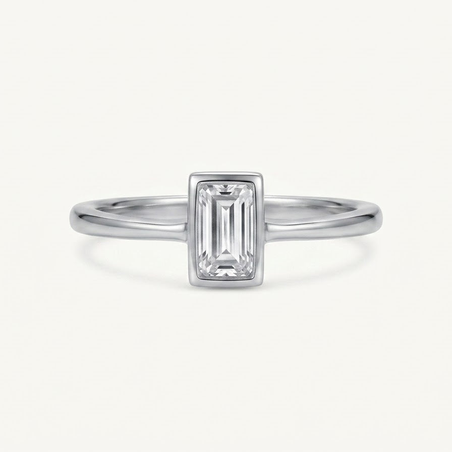 Elegant Rectangular Solitaire Ring with Clear Baguette-Cut Stone