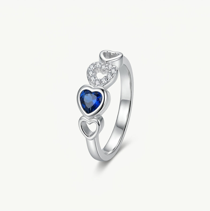 Silver Heart Ring with Blue Gemstone & Sparkling Heart Accents