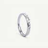 Elegant Silver Textured Band Ring with Geometric Cutout Design