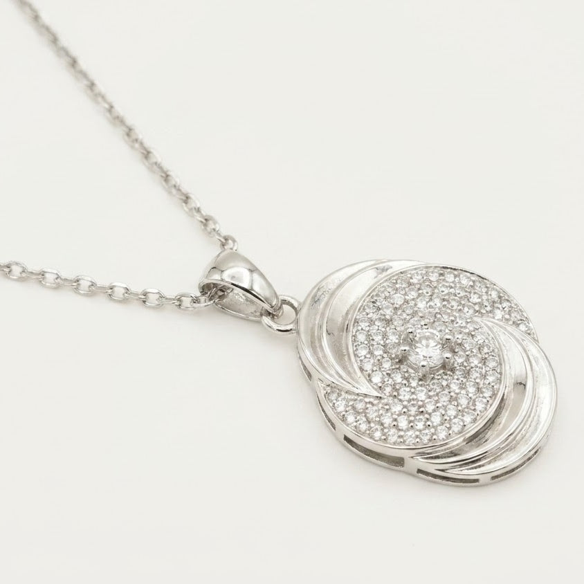 Elegant Swirl Pavé Pendant Necklace & Earrings Set