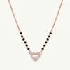 Rose Gold Heart Pendant Necklace with Black Bead Accents