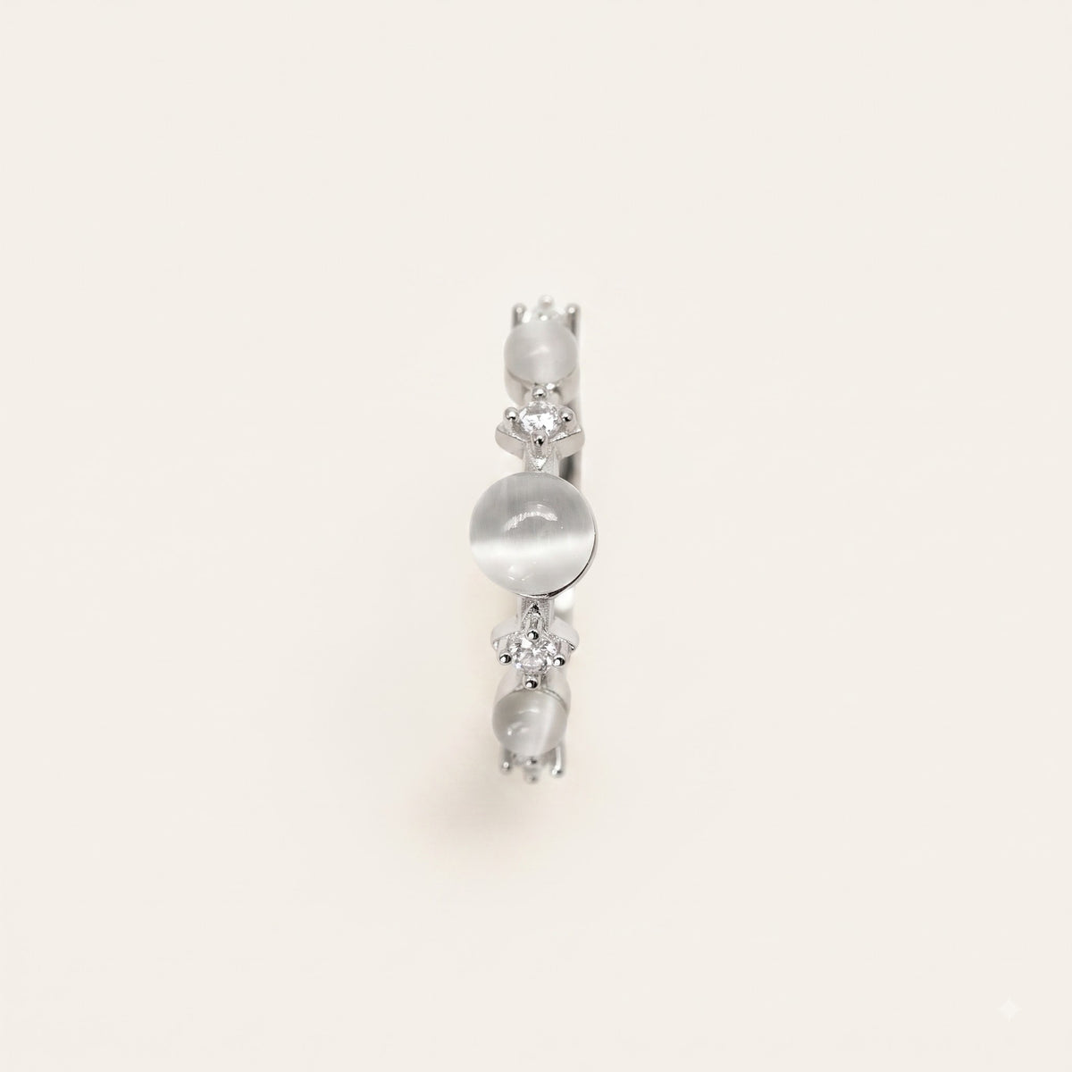 Elegant Silver Ring with White Cat Eye-Style Stones & Crystal Accents