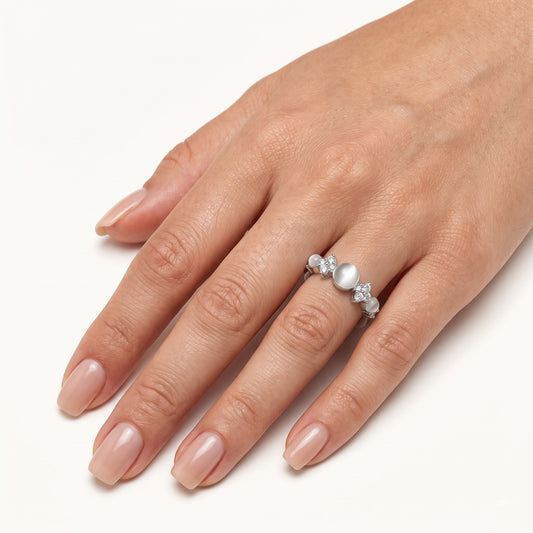 Elegant Silver Ring with White Cat Eye-Style Stones & Crystal Accents