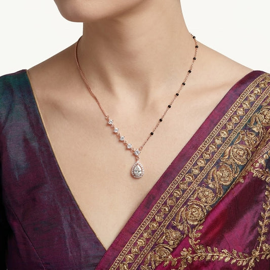 Rose Gold Teardrop Crystal Pendant Necklace with Black Bead Accents