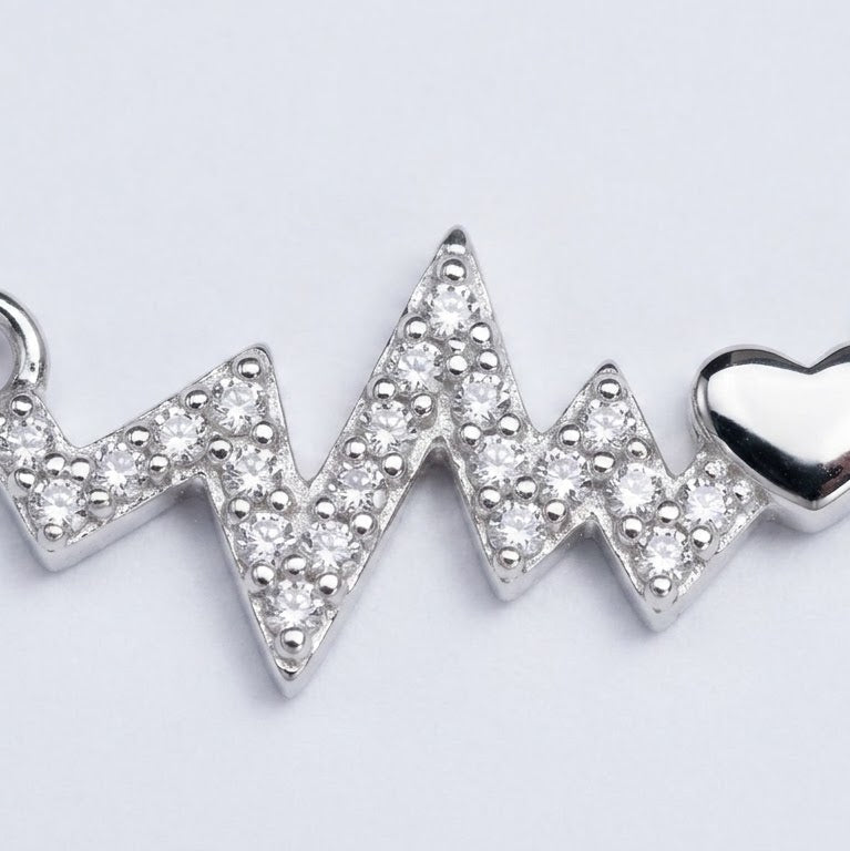 Elegant Silver Heartbeat Necklace with Sparkling Heart Accent