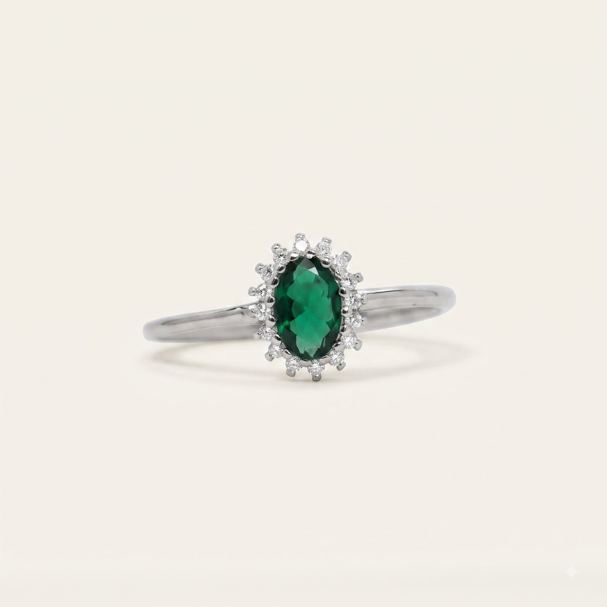 Elegant Green Emerald-Style Oval Halo Ring with Sparkling Accents