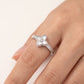 Elegant Silver Clover Ring with White Center Stone & Baguette Accents