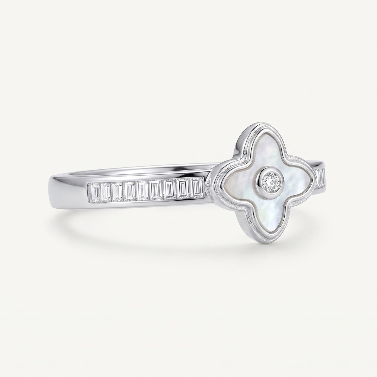 Elegant Silver Clover Ring with White Center Stone & Baguette Accents