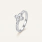 Elegant Silver Clover Ring with White Center Stone & Baguette Accents