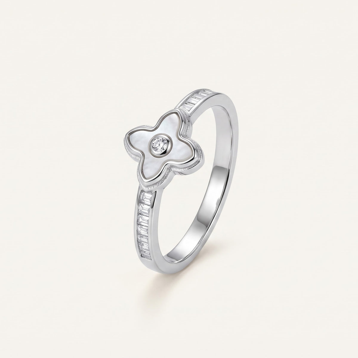 Elegant Silver Clover Ring with White Center Stone & Baguette Accents