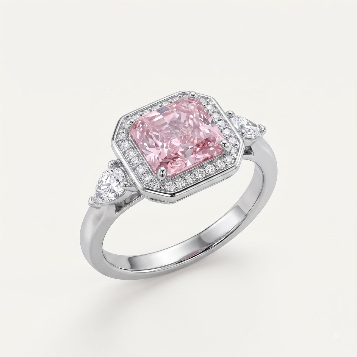 Elegant Pink Cushion-Cut Halo Ring with Pear-Shaped Side Stones