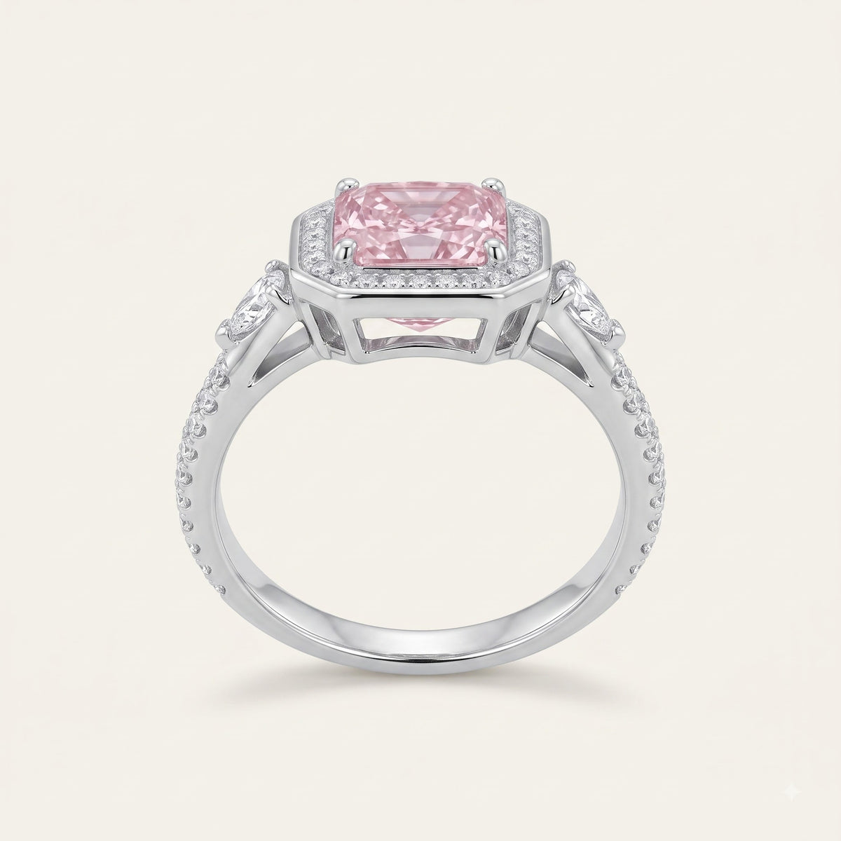 Elegant Pink Cushion-Cut Halo Ring with Pear-Shaped Side Stones