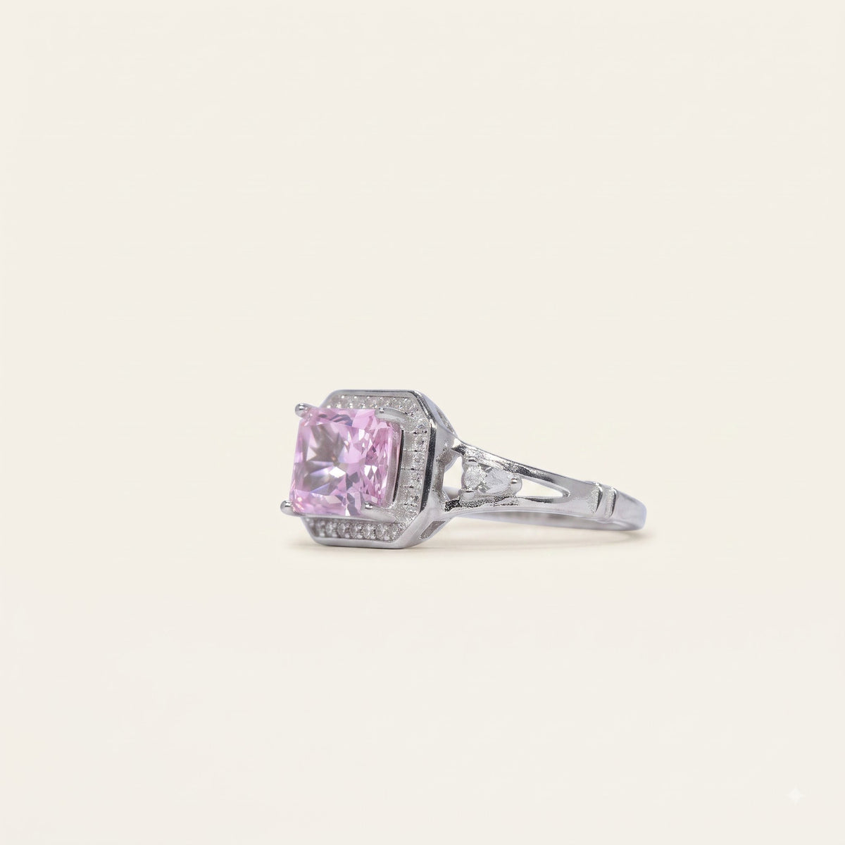 Elegant Pink Cushion-Cut Halo Ring with Pear-Shaped Side Stones