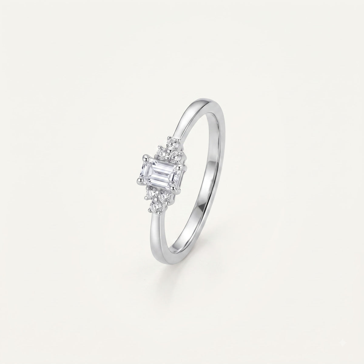 Elegant Emerald-Cut Crystal Ring with Sparkling Side Accents