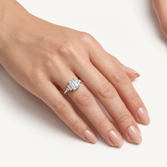 Elegant Emerald-Cut Crystal Ring with Sparkling Side Accents