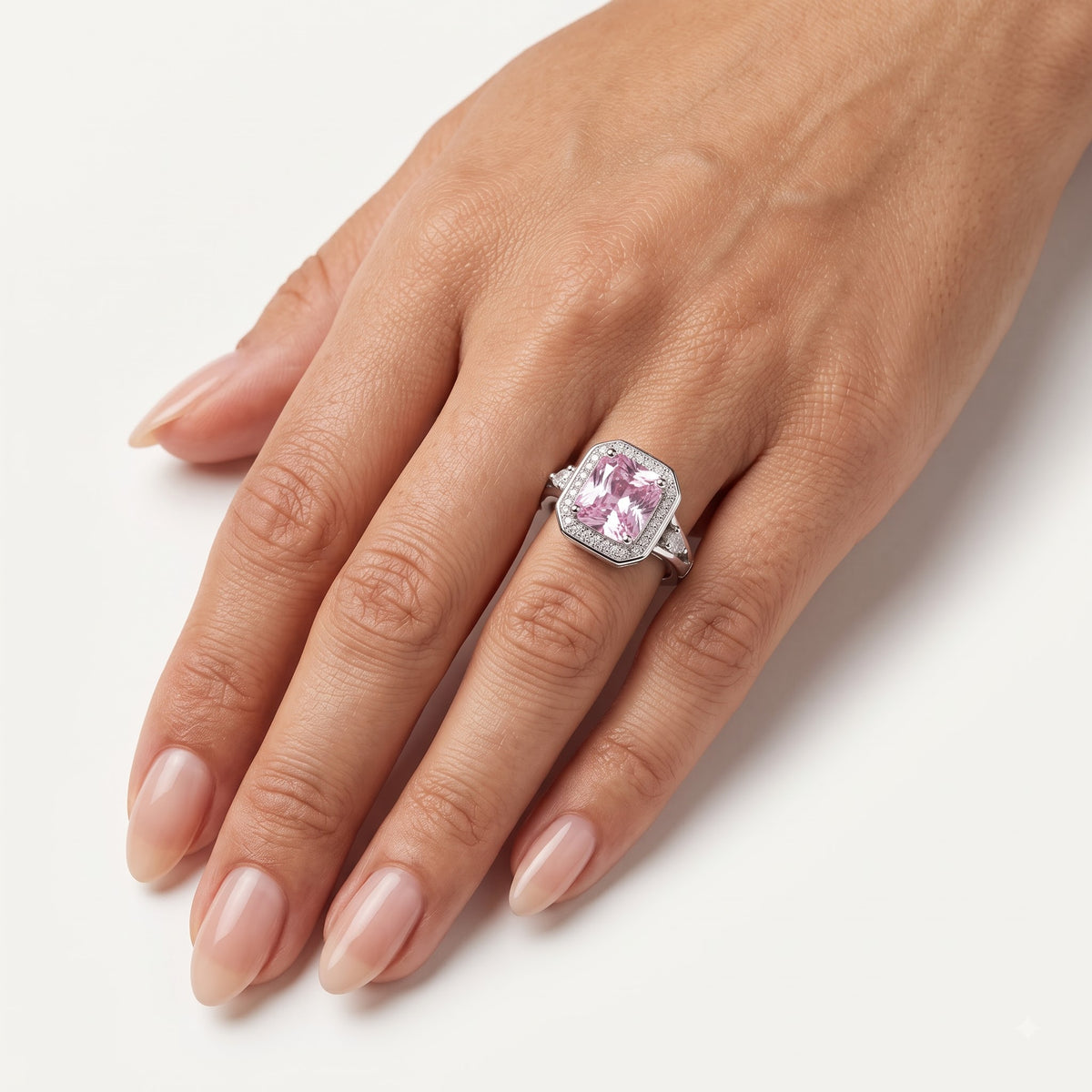 Elegant Pink Cushion-Cut Halo Ring with Pear-Shaped Side Stones