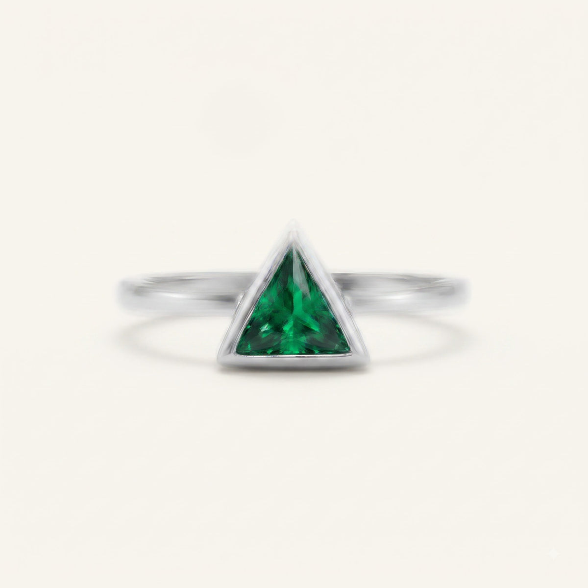 Emerald Green Triangle Solitaire Ring with Polished Silver-Tone Setting