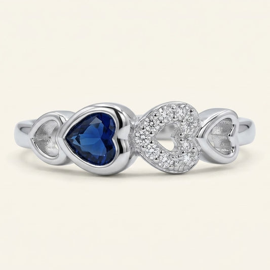 Silver Heart Ring with Blue Gemstone & Sparkling Heart Accents