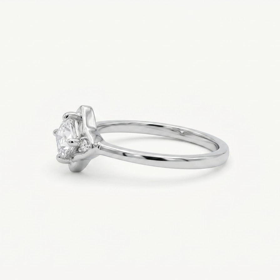 Elegant Round-Cut Solitaire Ring with Sculpted Silver Setting