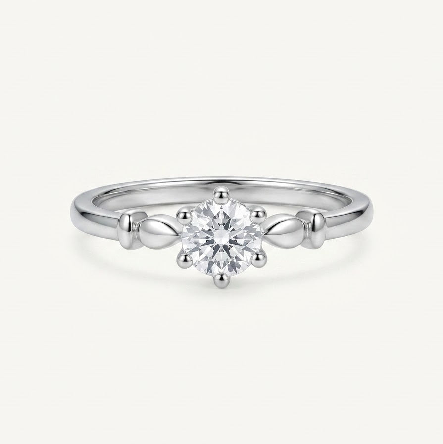 Elegant Silver Solitaire Ring with Round Sparkling Stone