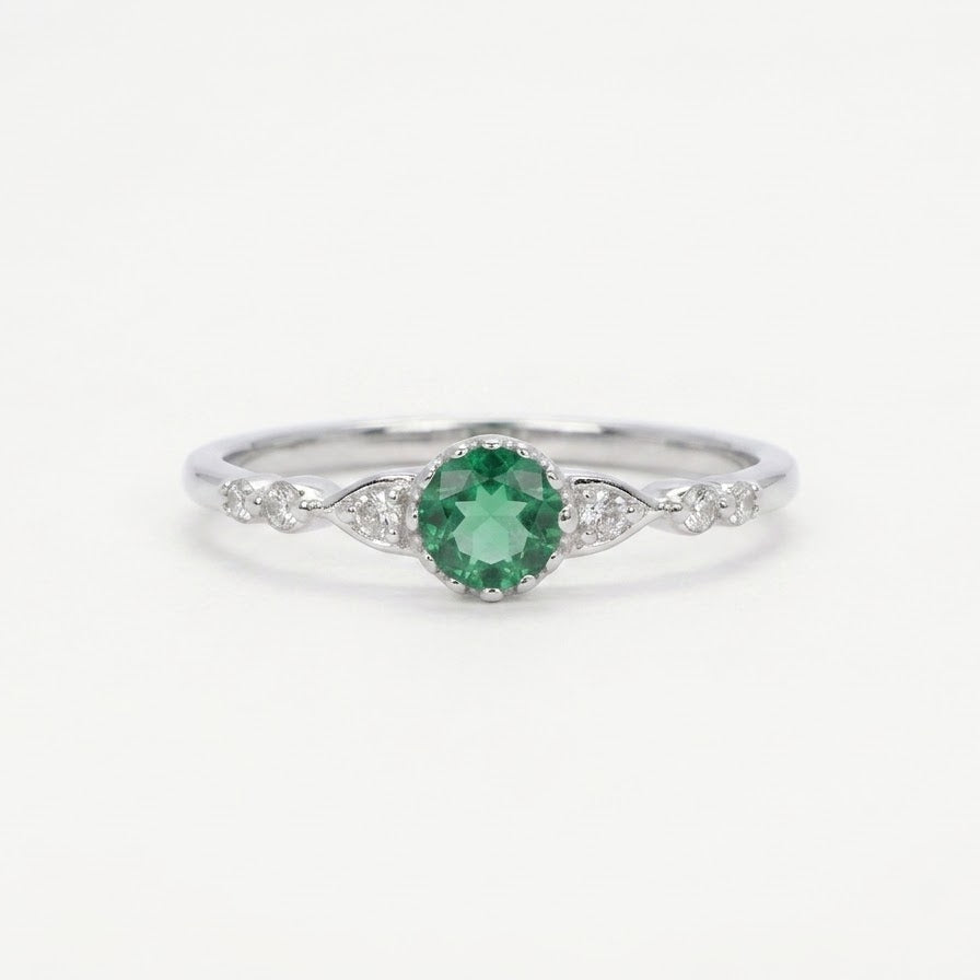Elegant Green Emerald-Style Round Cluster Ring with Sparkling Stone Accents
