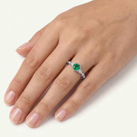 Elegant Green Emerald-Style Round Cluster Ring with Sparkling Stone Accents