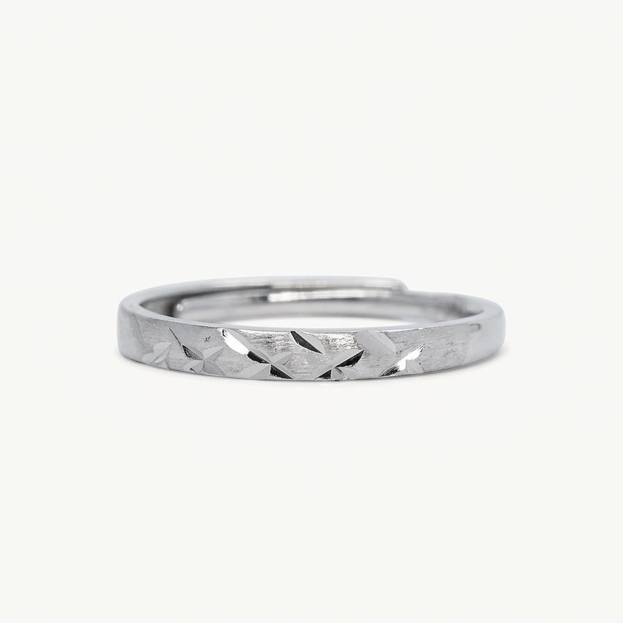 Elegant Silver Textured Band Ring with Geometric Cutout Design