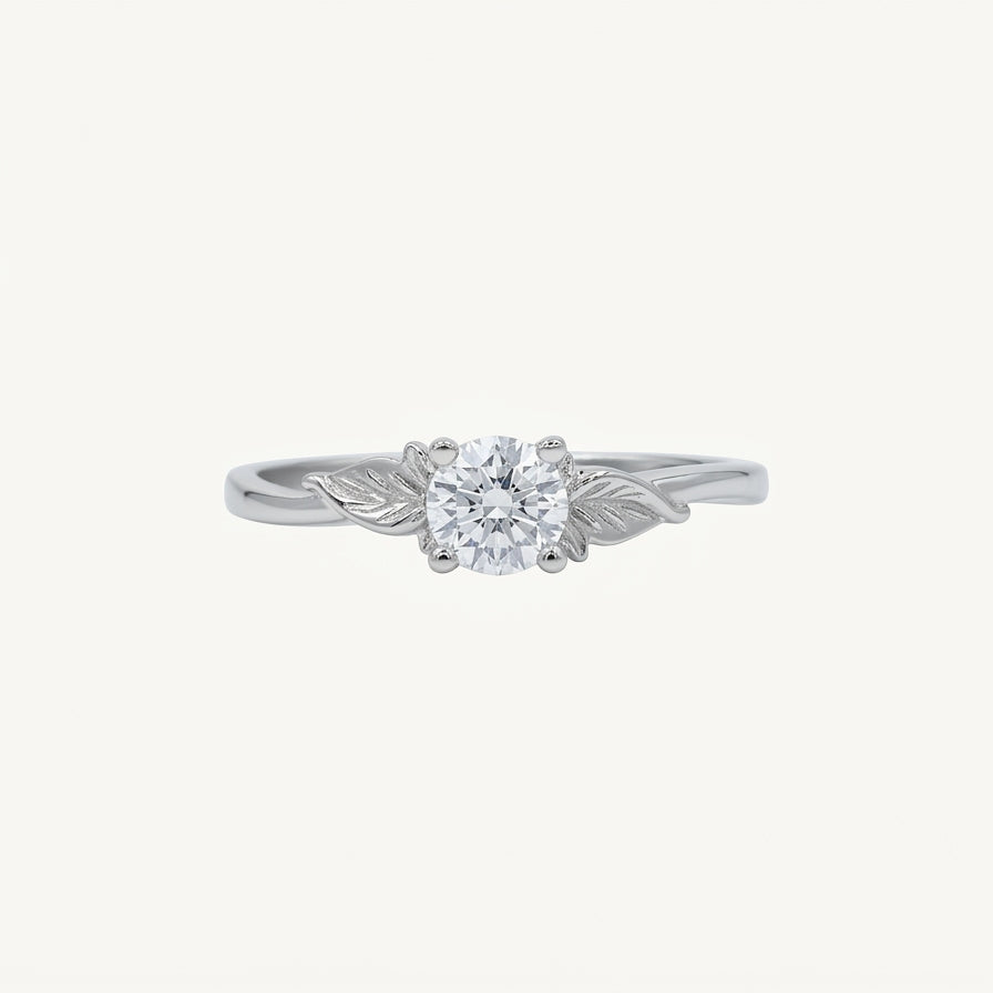Elegant Silver Solitaire Ring with Leaf-Inspired Sparkling Design