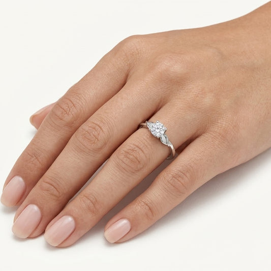 Elegant Silver Solitaire Ring with Leaf-Inspired Sparkling Design