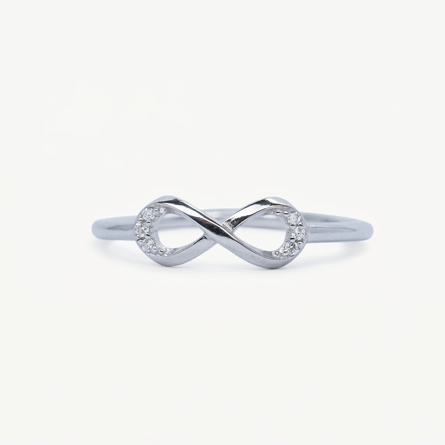 Elegant Infinity Knot Crystal Ring with Sparkling Accents
