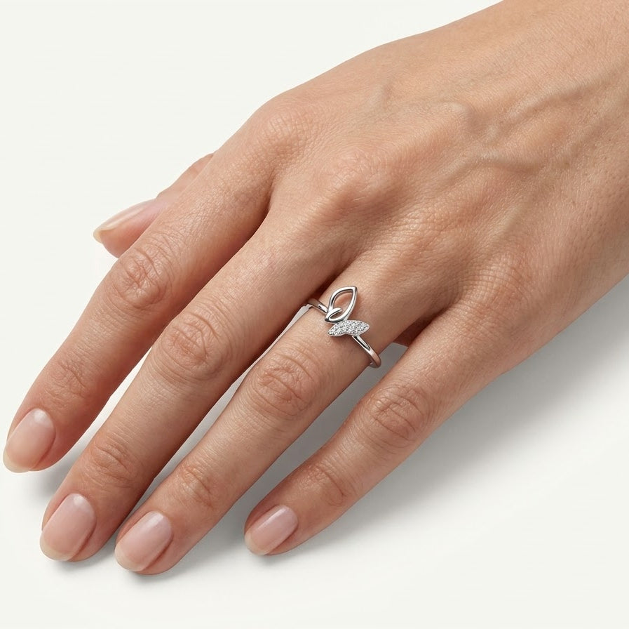 Elegant Silver Bow Pave Ring with Sparkling Detailing