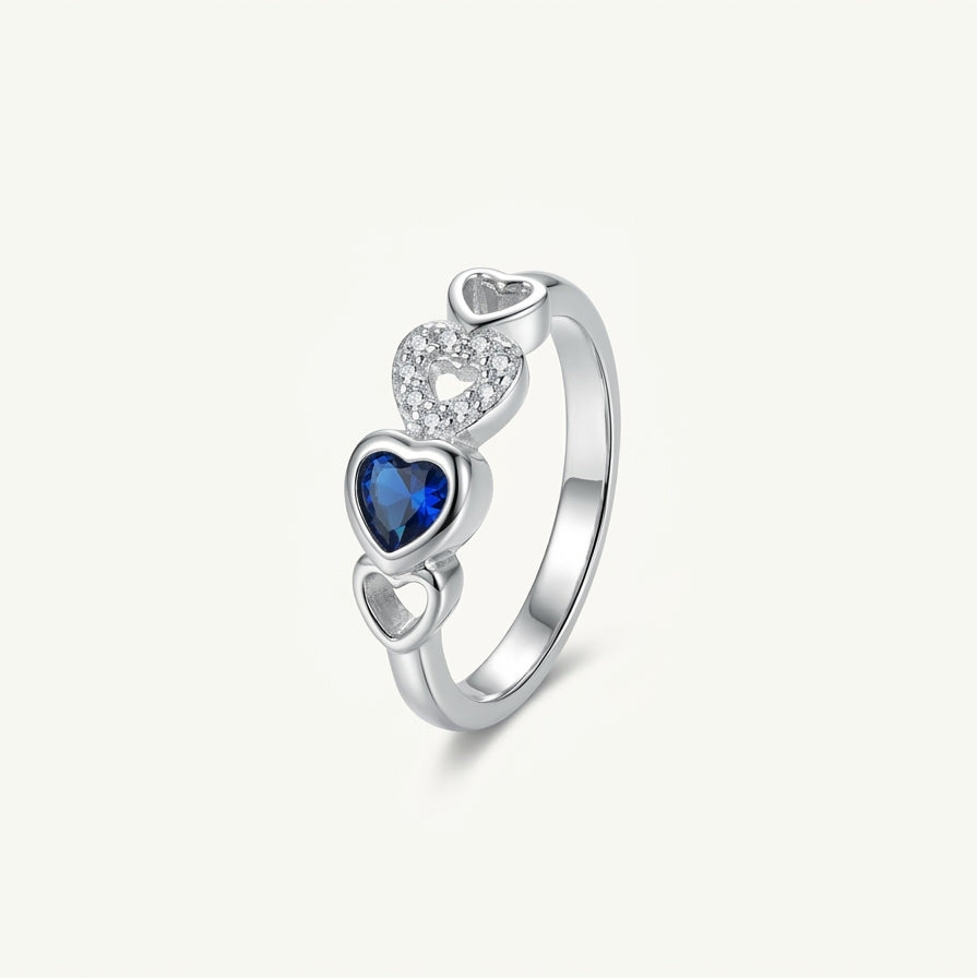 Silver Heart Ring with Blue Gemstone & Sparkling Heart Accents