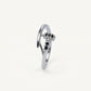Elegant Silver Hook-Inspired Ring with Black Stone Accents