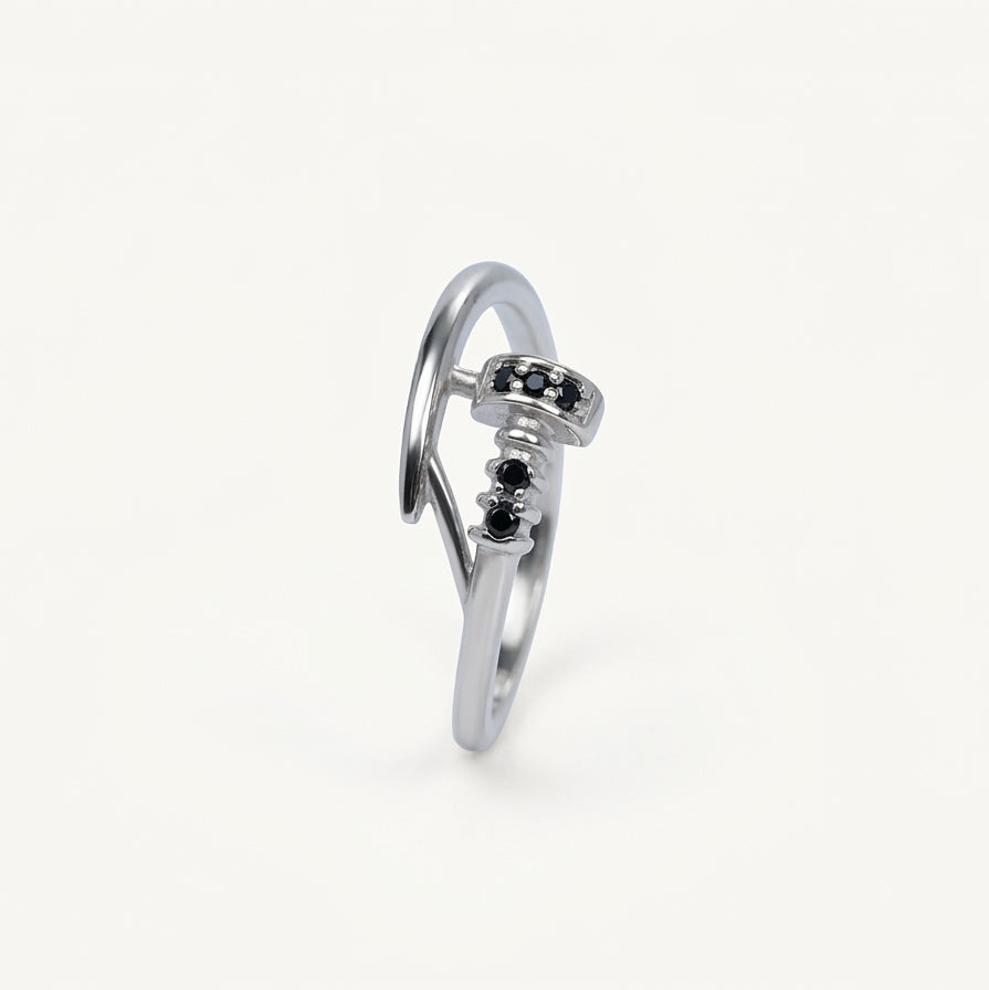 Elegant Silver Hook-Inspired Ring with Black Stone Accents