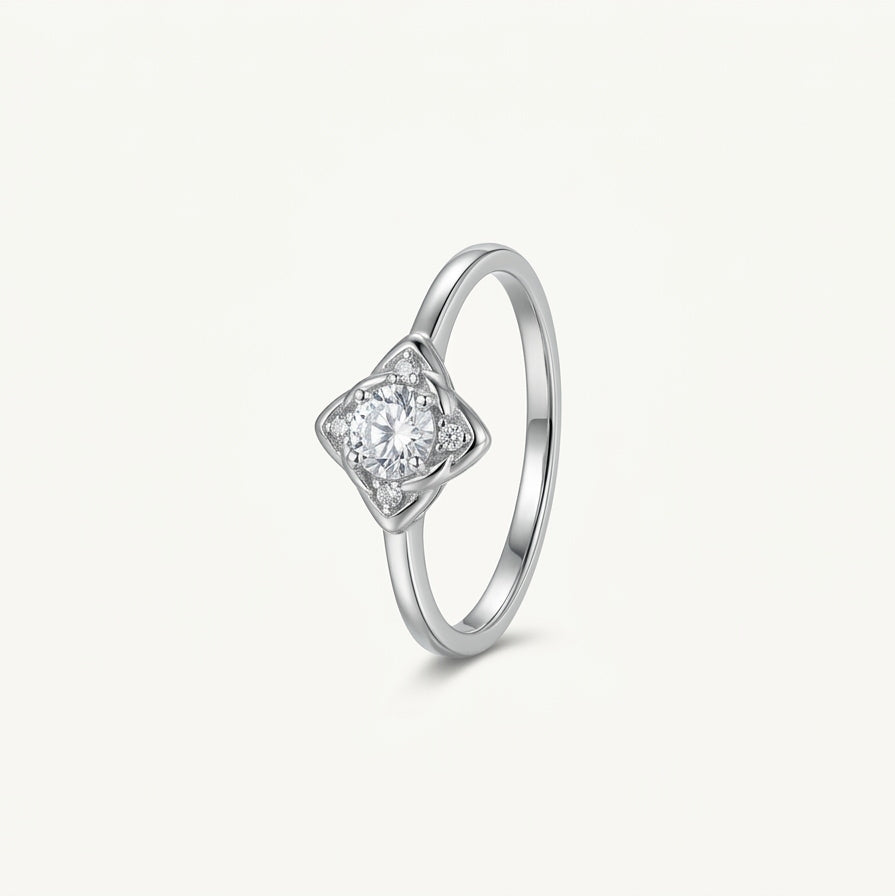 Elegant Round-Cut Solitaire Ring with Sculpted Silver Setting