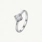 Elegant Round-Cut Solitaire Ring with Sculpted Silver Setting