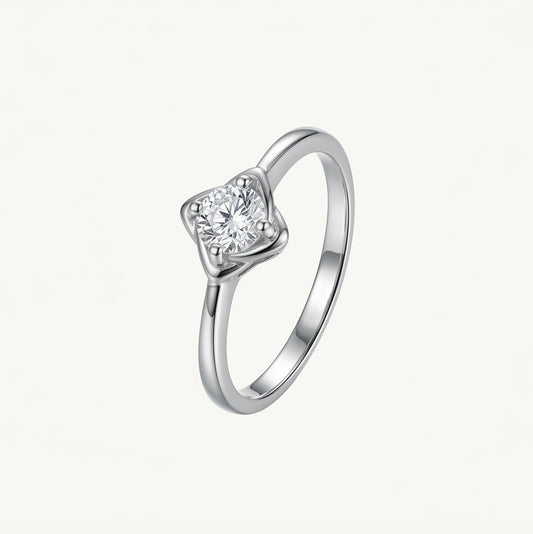Elegant Round-Cut Solitaire Ring with Sculpted Silver Setting