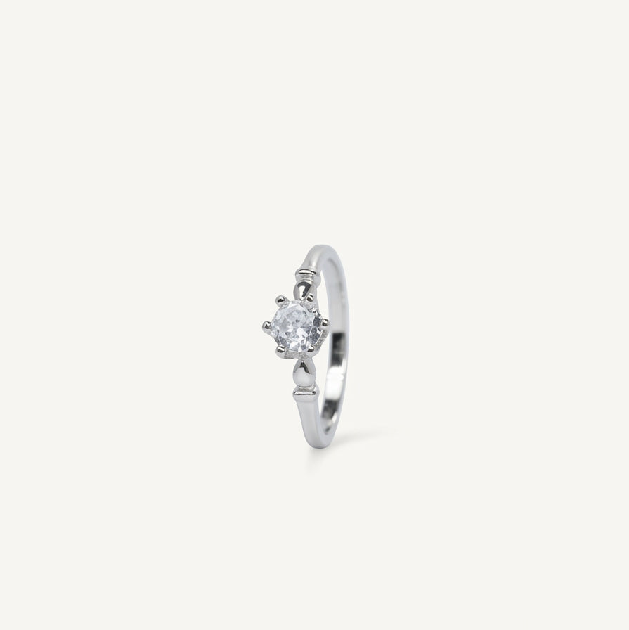 Elegant Silver Solitaire Ring with Round Sparkling Stone