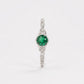 Elegant Green Emerald-Style Round Cluster Ring with Sparkling Stone Accents