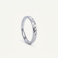 Elegant Silver Textured Band Ring with Geometric Cutout Design