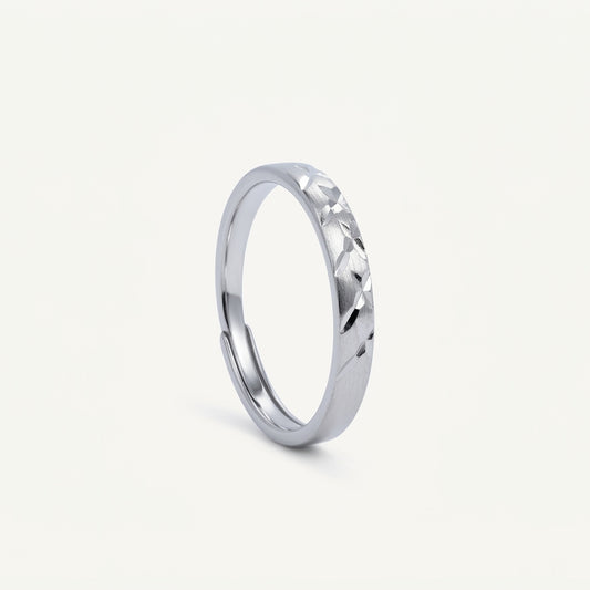 Elegant Silver Textured Band Ring with Geometric Cutout Design