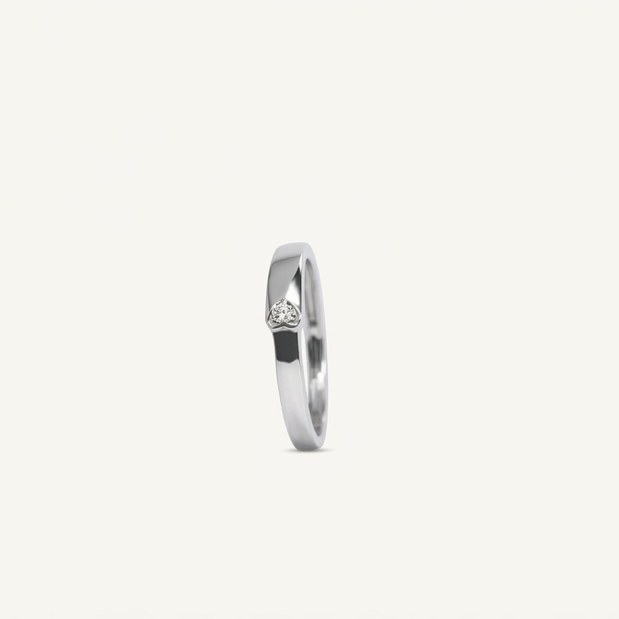Elegant Heart Accent Ring with Polished Silver-Tone Band