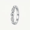 Elegant Silver Beaded Ring with Sparkling Pavé Stone Clusters
