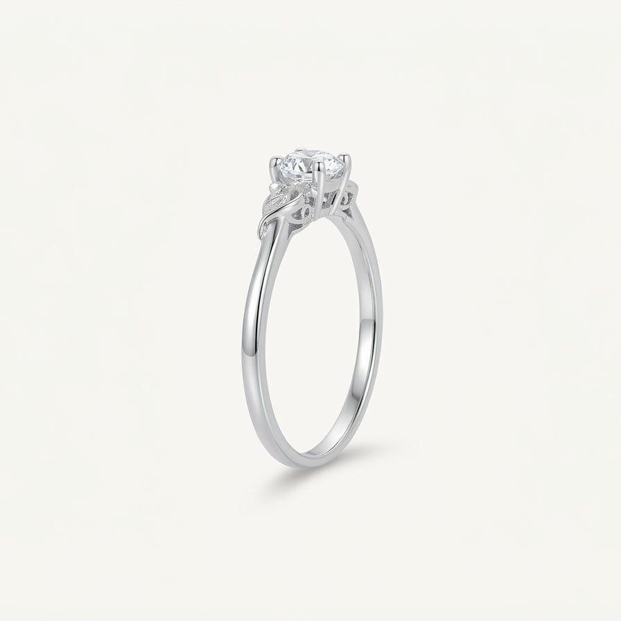 Elegant Silver Solitaire Ring with Leaf-Inspired Sparkling Design