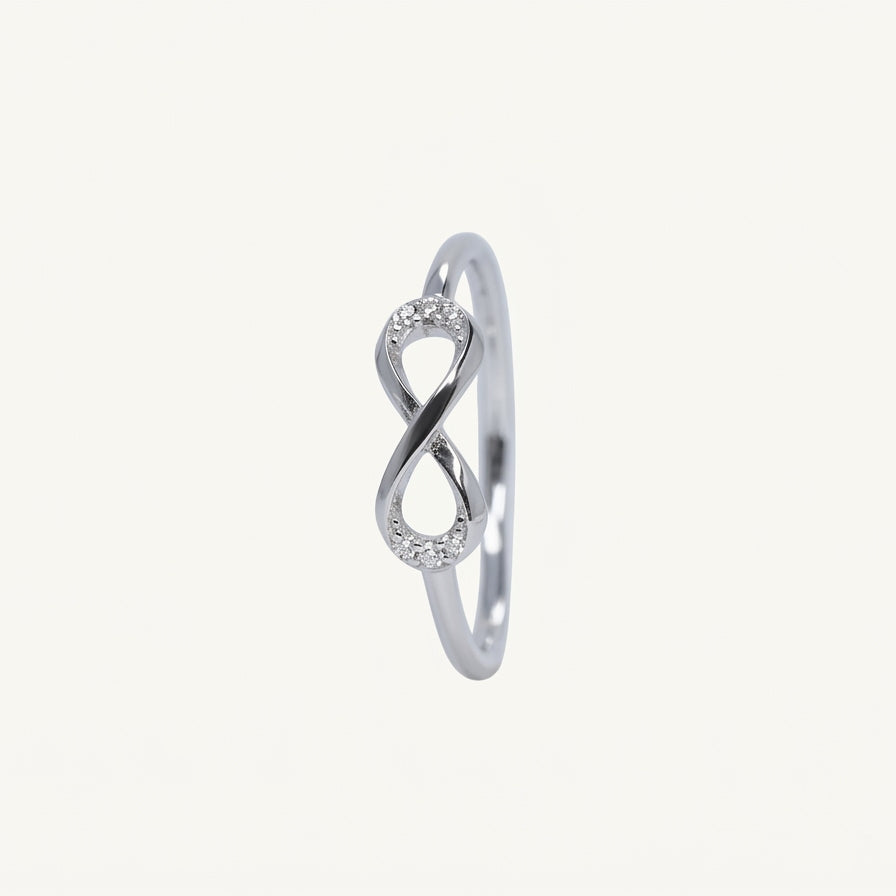 Elegant Infinity Knot Crystal Ring with Sparkling Accents