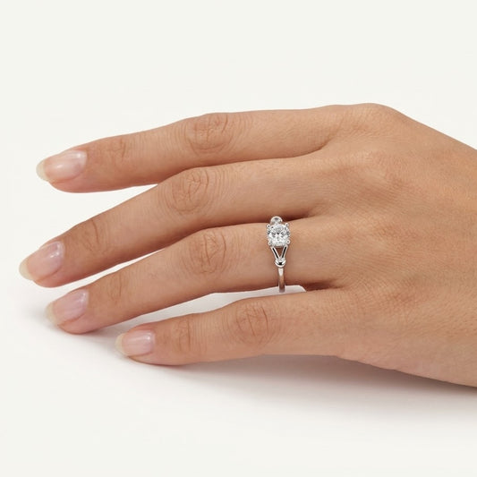 Elegant Rectangular Solitaire Ring with Clear Baguette-Cut Stone