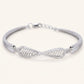 Infinity Twist Pavé Bracelet – Elegant Statement Bracelet
