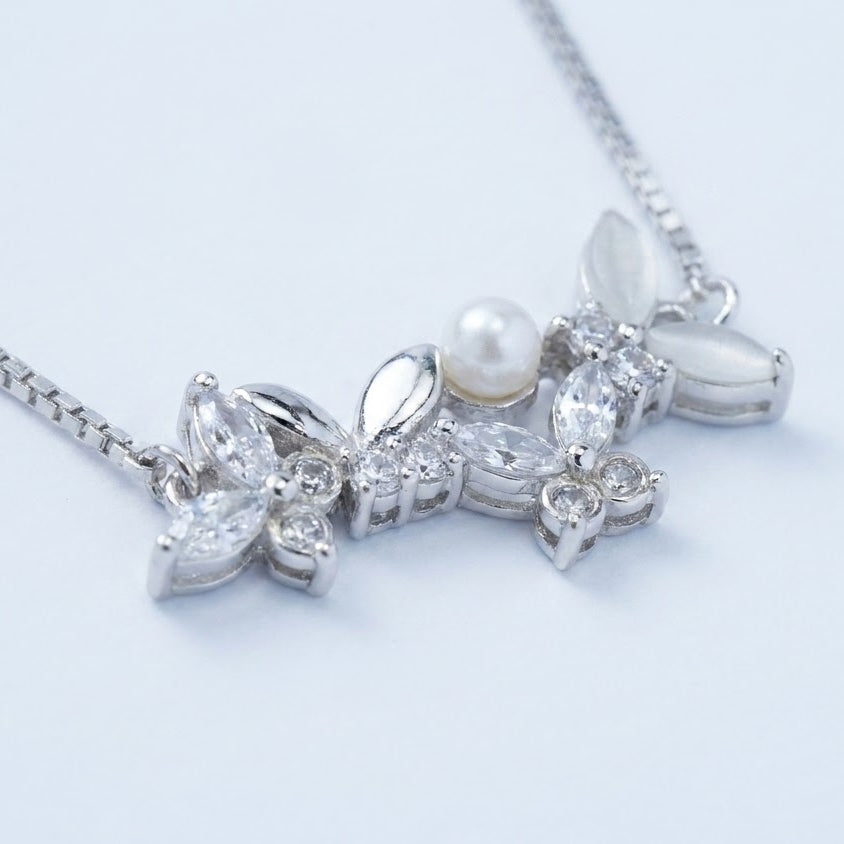 Silver Floral Pearl Vine Necklace with Leaf & Crystal Details