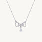 Elegant Silver Bow Necklace with Sparkling Teardrop Pendant